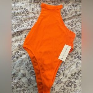 Sexy orange bodysuit